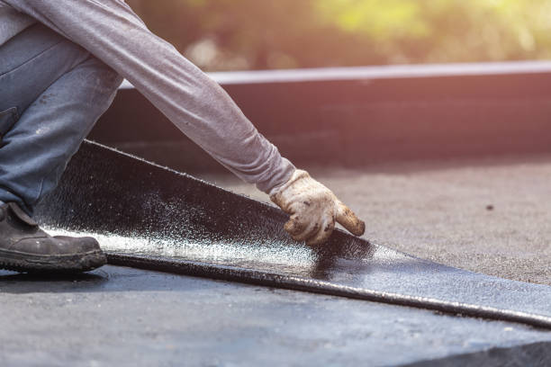 Professional Exterior Waterproofing technician working in Madison, NC